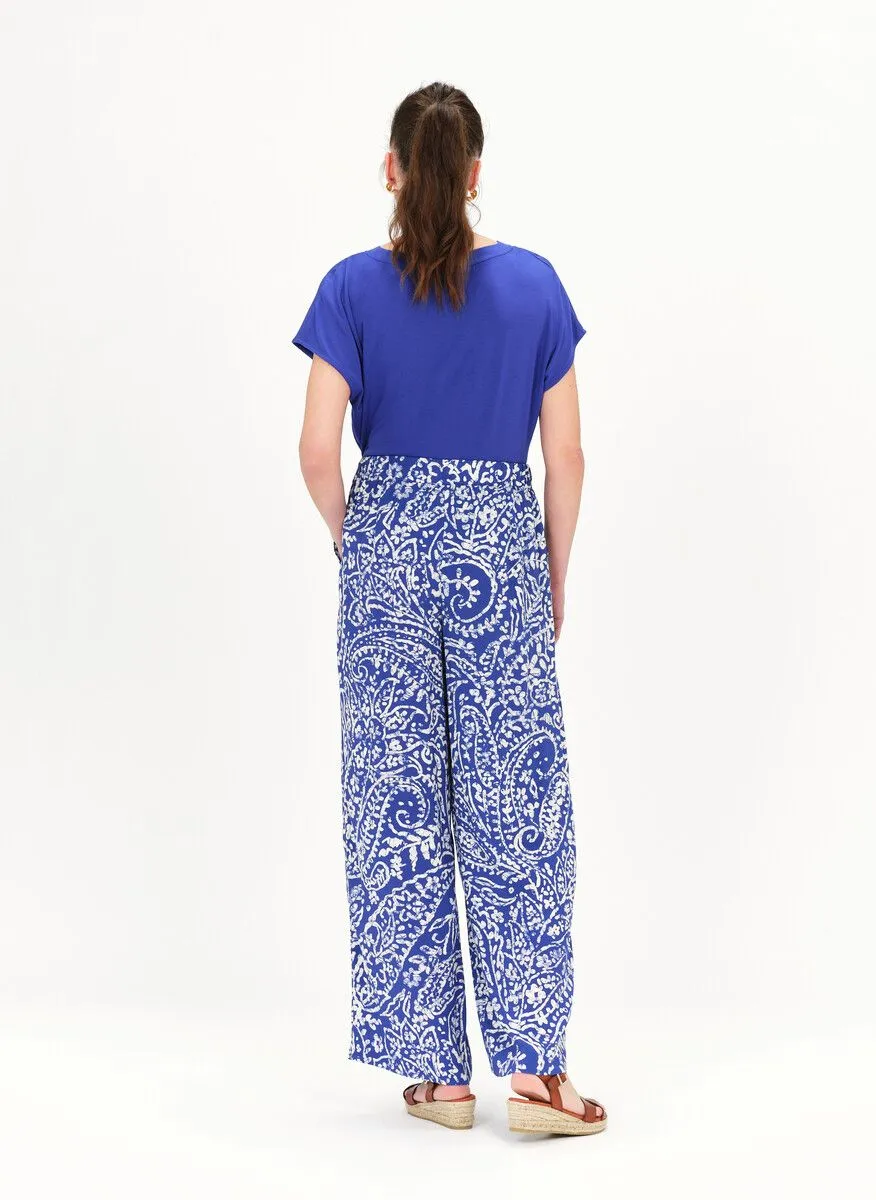 CAROLL PFLUIDE - Pantalón recto con estampado cachemira en azul